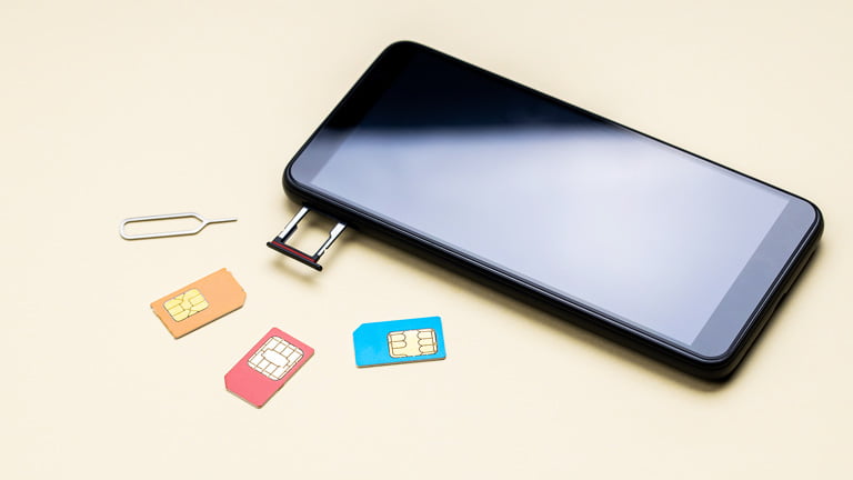 Pin and smartphone with multiple different SIM cards and SIM tray